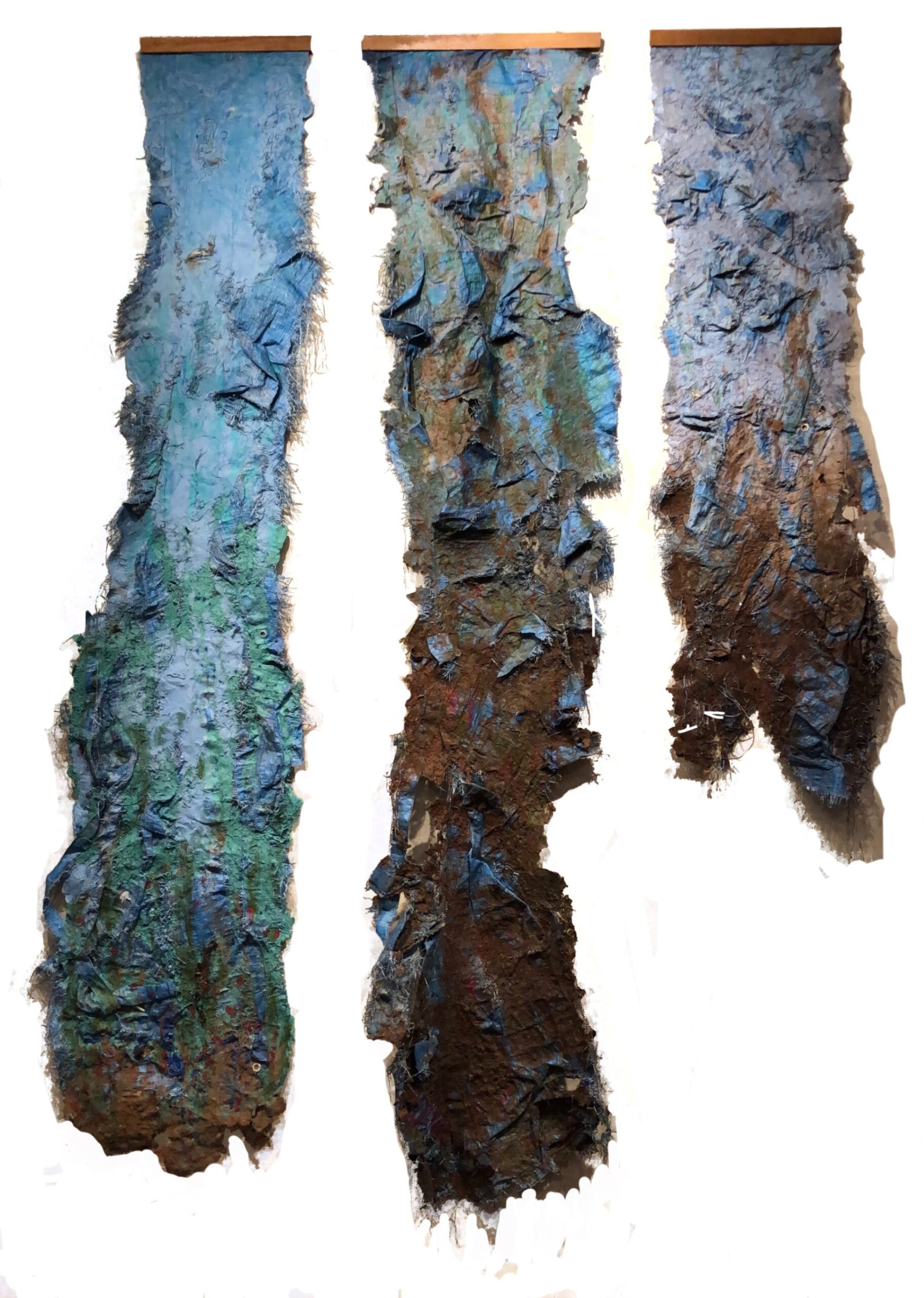 Textured blue and brown abstract tapestries