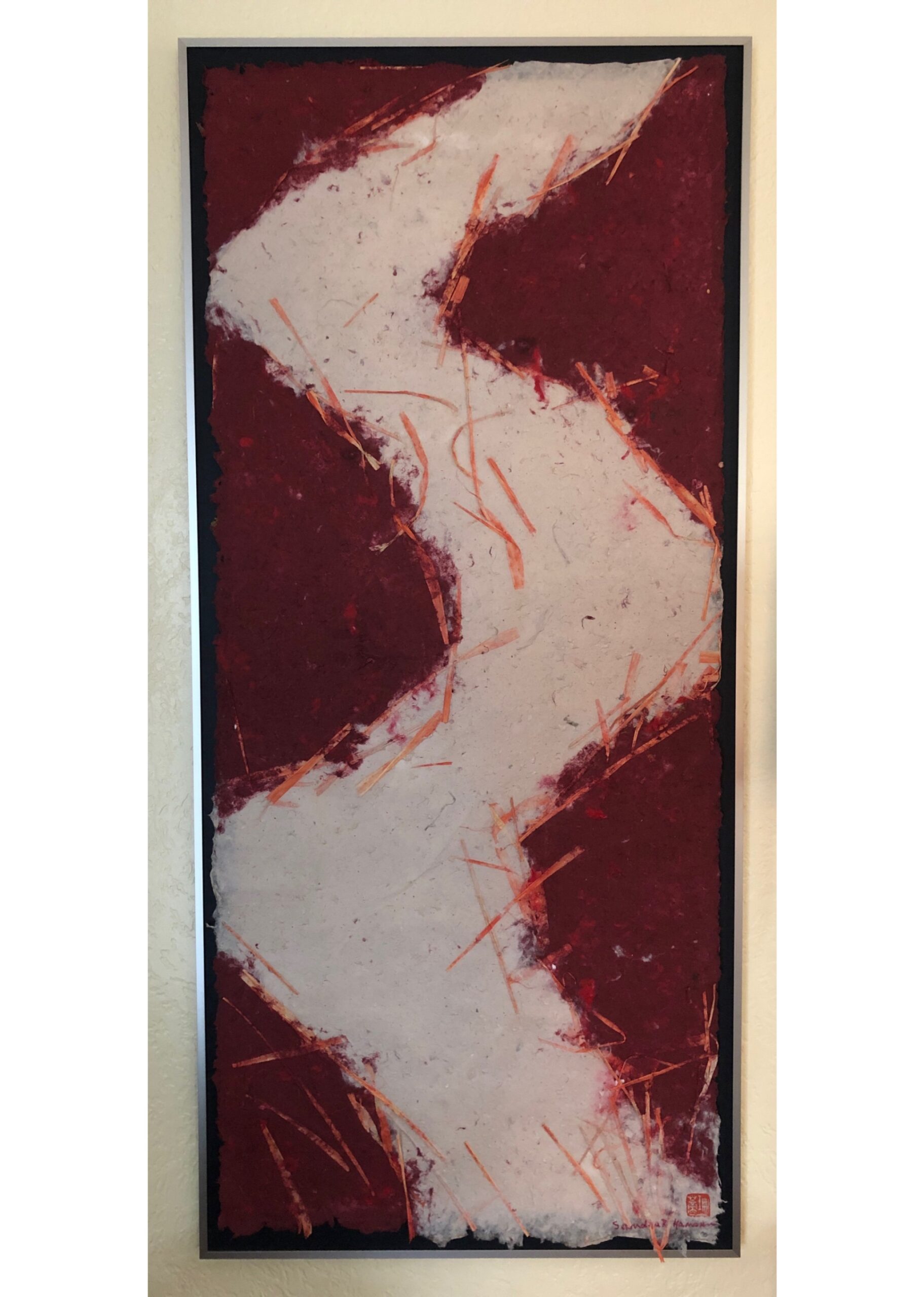 Abstract painting with red and white swirls