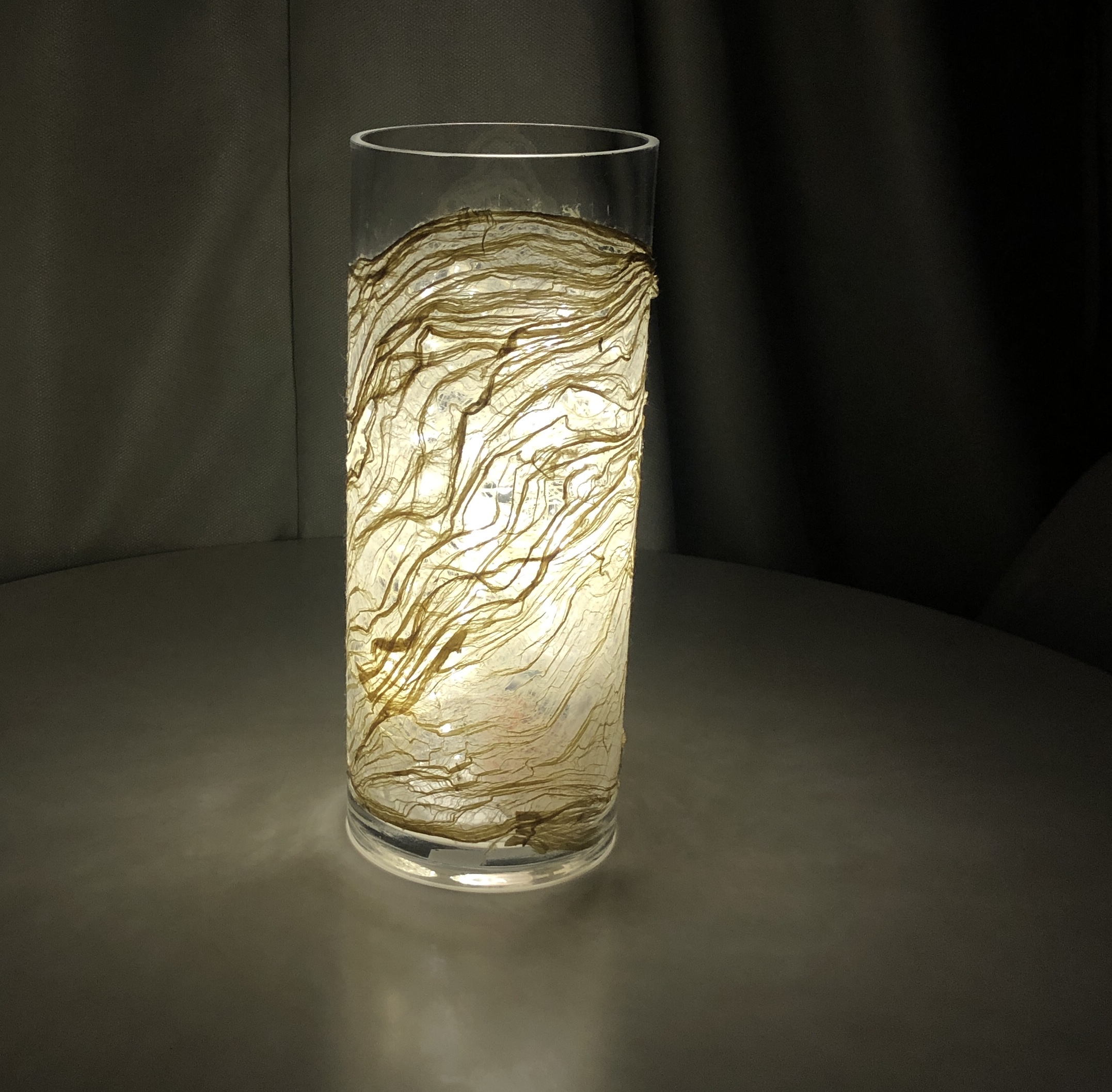 Glowing decorative glass cylinder lamp